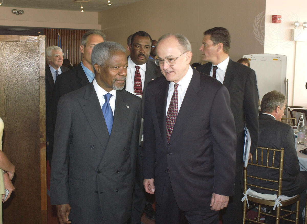 Secretary-General Kofi Annan (left) and John Ruggie (right), Special Adviser to the Secretary-General, as they arrive to attend a meeting of the Global Compact Summit at headquarters. 24 June 2004. UN Photo/Eskinder Debebe.