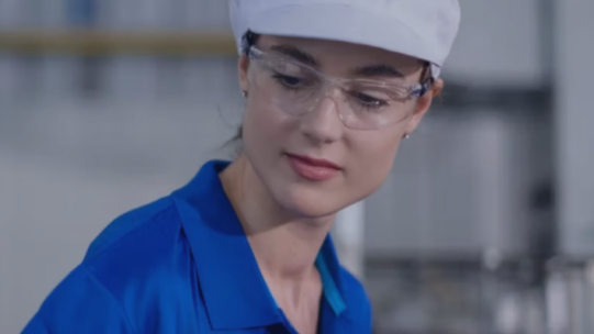 female worker with hat on